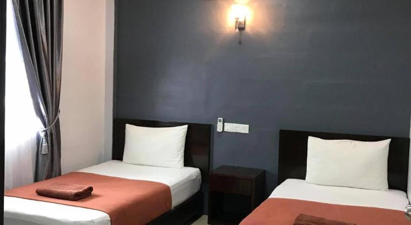 Capital O 90490 Zaques Hotel Sungai Petani Buitenkant foto