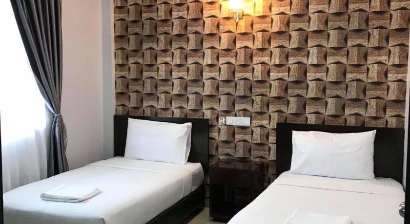 Capital O 90490 Zaques Hotel Sungai Petani Buitenkant foto